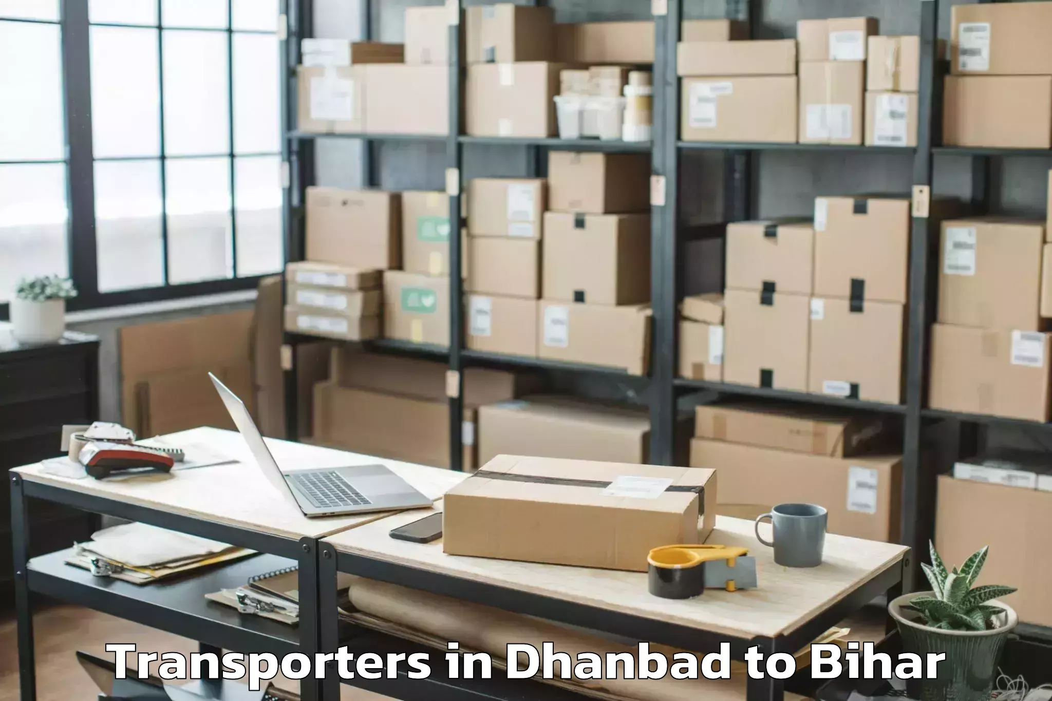 Easy Dhanbad to Wazirganj Transporters Booking